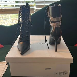Balmain booties with small chain on back